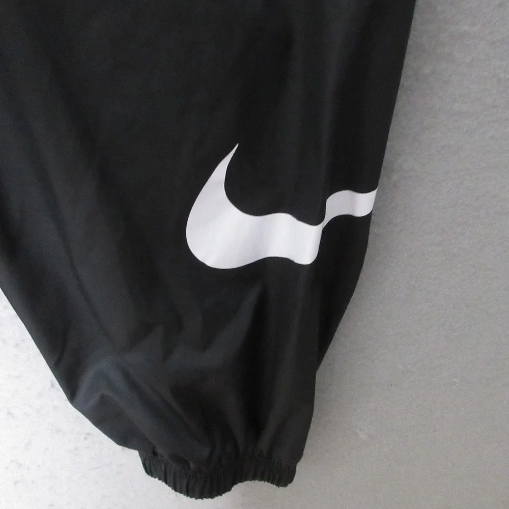 Nike Sportwear Joggers Pants Women Medium Black Woven Swoosh Sporty Windbreaker